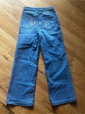 Juicy Couture High Rise Wide Leg Jeans in Blue with Rhinestone Back Pocket
